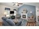 Living room with fireplace and vaulted ceiling at 409 Chinaberry Dr, China Grove, NC 28023