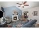 Spacious living room with a fireplace and vaulted ceiling at 409 Chinaberry Dr, China Grove, NC 28023