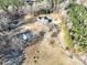 House with multiple sheds on large lot with mature trees at 41943 Gurley Rd, New London, NC 28127