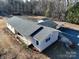 Aerial view of a Ranch home, detached shed, and covered parking at 41943 Gurley Rd, New London, NC 28127