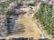 Aerial view showing home, land, and outbuildings at 41943 Gurley Rd, New London, NC 28127