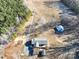 Aerial view of house and surrounding land with trees at 41943 Gurley Rd, New London, NC 28127