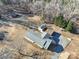 Overhead view of house, detached garage, and yard at 41943 Gurley Rd, New London, NC 28127