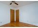 Bedroom with hardwood floors, ceiling fan and two closets at 41943 Gurley Rd, New London, NC 28127