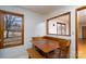 Kitchen with built-in bench seating and views of the backyard at 41943 Gurley Rd, New London, NC 28127