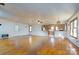 Hardwood floor living room with kitchen passthrough at 41943 Gurley Rd, New London, NC 28127