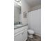 Clean bathroom with white vanity, granite countertop, and shower/tub combo at 4479 Dover Ct, Denver, NC 28037