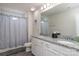 Clean bathroom with double sinks, granite countertop, and shower/tub combo at 4479 Dover Ct, Denver, NC 28037