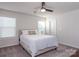 Spacious bedroom with carpeted floor and ceiling fan at 4479 Dover Ct, Denver, NC 28037