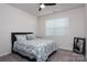 Cozy bedroom with a queen-size bed and ample natural light at 4479 Dover Ct, Denver, NC 28037