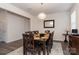 Bright dining area with a dark wood dining set at 4479 Dover Ct, Denver, NC 28037