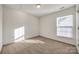 Simple bedroom with neutral walls and carpet flooring at 4649 Maple Crest Pl, Harrisburg, NC 28075