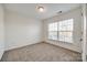 Bright bedroom with large window and neutral decor at 4649 Maple Crest Pl, Harrisburg, NC 28075