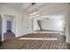 Spacious dining area with hardwood floors and a chandelier at 4649 Maple Crest Pl, Harrisburg, NC 28075