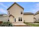 Backyard view of the home with patio and fire pit area at 5124 Craftsman Ridge Dr, Matthews, NC 28104