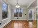 Bright dining area with hardwood floors and large windows at 5124 Craftsman Ridge Dr, Matthews, NC 28104