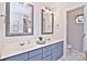 Bathroom with dual vanity and a large mirror at 5921 Marshbank Ln, Charlotte, NC 28269