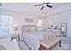 Bright bedroom with neutral decor and natural light at 5921 Marshbank Ln, Charlotte, NC 28269