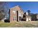 Two-story brick home with a two-car garage and neat landscaping at 5921 Marshbank Ln, Charlotte, NC 28269