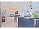 Modern kitchen with white cabinets, granite counters, and stainless steel appliances at 5921 Marshbank Ln, Charlotte, NC 28269