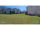 Large grassy area behind condo building at 6127 Meadow Rose Ln, Charlotte, NC 28215