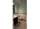 Updated bathroom with subway tile and black and white floor at 6127 Meadow Rose Ln, Charlotte, NC 28215