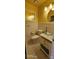 Charming bathroom with yellow walls, glass sink and hexagon tile at 6127 Meadow Rose Ln, Charlotte, NC 28215