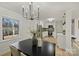 Modern dining room with black table and stylish decor at 6706 Queensberry Dr, Charlotte, NC 28226