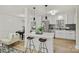 Modern kitchen with white cabinets and quartz countertops at 6706 Queensberry Dr, Charlotte, NC 28226