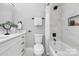 Clean bathroom featuring a bathtub, shower, and marble tile at 6762 Glenmoor Dr, Charlotte, NC 28214