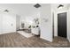 Bright entryway with tile flooring, leading to living room and hallway at 7010 Sycamore Grove Ct, Charlotte, NC 28227