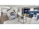 Open living space featuring a stylish living room and contemporary kitchen at 7010 Sycamore Grove Ct, Charlotte, NC 28227