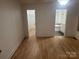 Bedroom with hardwood floors and ensuite bathroom at 7104 Sandy Smith Rd, Marshville, NC 28103