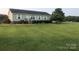 Single-story home with large yard at 7104 Sandy Smith Rd, Marshville, NC 28103