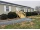 House exterior with new steps and landscaping at 7104 Sandy Smith Rd, Marshville, NC 28103