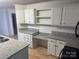 Kitchen with granite countertops and white cabinets at 7104 Sandy Smith Rd, Marshville, NC 28103