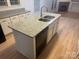 Kitchen island with granite countertops and sink at 7104 Sandy Smith Rd, Marshville, NC 28103