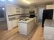 Kitchen with island and granite countertops at 7104 Sandy Smith Rd, Marshville, NC 28103