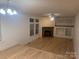 Living room with fireplace and built-in shelving at 7104 Sandy Smith Rd, Marshville, NC 28103