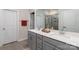 Modern bathroom with double vanity, large mirror, and a walk-in shower at 7163 Yardley St, Gastonia, NC 28056