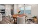 Kitchen dining area with round wooden table at 7163 Yardley St, Gastonia, NC 28056