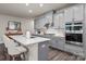 Gray kitchen with island and double oven at 7163 Yardley St, Gastonia, NC 28056