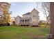 Two story house with deck, screen porch and fenced backyard at 819 Lillieshall Rd, Waxhaw, NC 28173