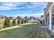 Landscaped backyard with privacy fence and trees at 8243 Bretton Woods Dr, Charlotte, NC 28227