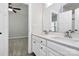 Double vanity bathroom with a modern white finish at 8243 Bretton Woods Dr, Charlotte, NC 28227