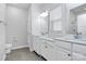 Bathroom boasts double vanity with quartz countertops at 8243 Bretton Woods Dr, Charlotte, NC 28227