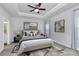 Cozy main bedroom with a king size bed, soft lighting, and modern decor at 8243 Bretton Woods Dr, Charlotte, NC 28227