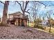 Backyard with fire pit and elevated deck at 835 Belmont Ave, Charlotte, NC 28205