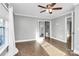 Spacious bedroom with hardwood floors and neutral wall colors at 835 Belmont Ave, Charlotte, NC 28205