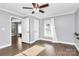 Well-lit bedroom with hardwood floors and neutral walls at 835 Belmont Ave, Charlotte, NC 28205